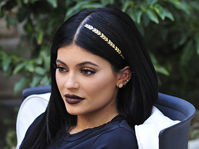 Kylie Jenner Shows Off One of the New Scunci Hair Tattoos While Playing with Her Dog Norman
