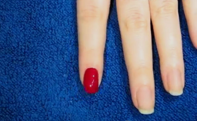 apply-red-nail-polish